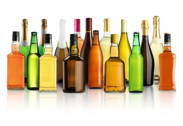Image of Bottles with different types of alcoholic drinks on white background, set