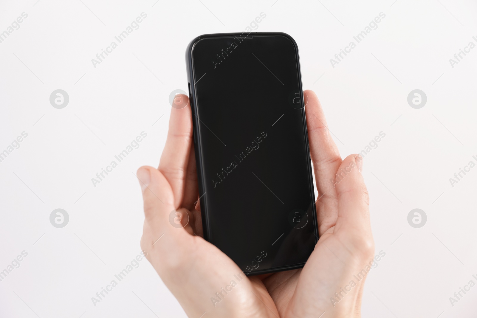 Woman holding smartphone with blank screen on white background, closeup. Mockup for design Photo of Woman holding smartphone with blank screen on white background, closeup. Mockup for design