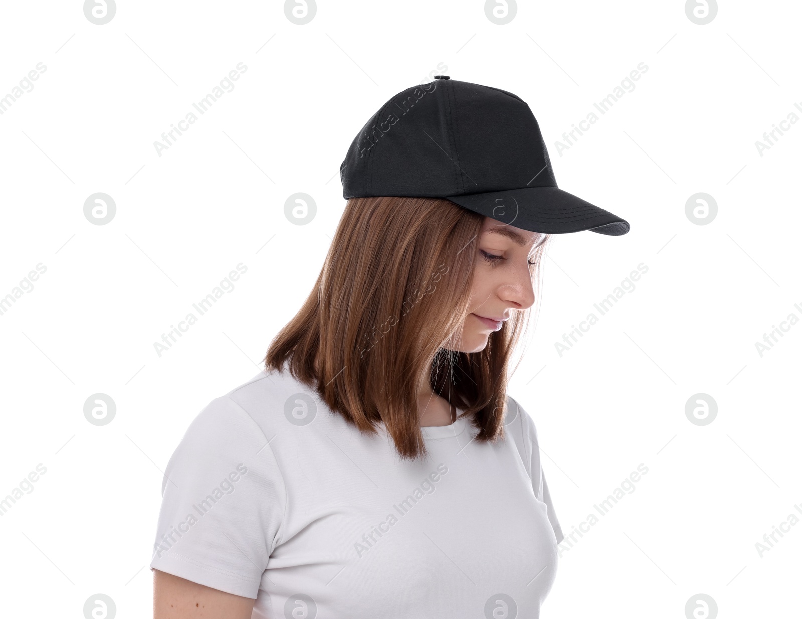 Photo of Young woman wearing stylish black baseball hat on white background