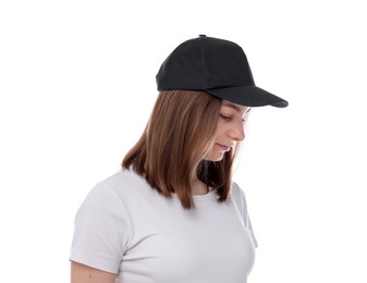 Photo of Young woman wearing stylish black baseball hat on white background