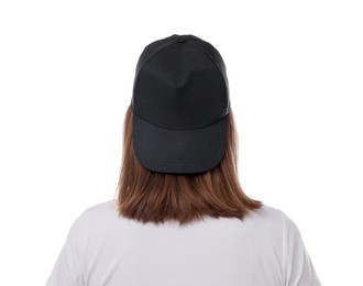 Photo of Young woman wearing stylish black baseball hat on white background, back view