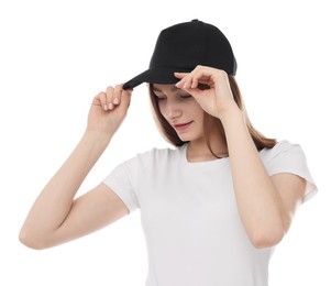Photo of Young woman wearing stylish black baseball hat on white background