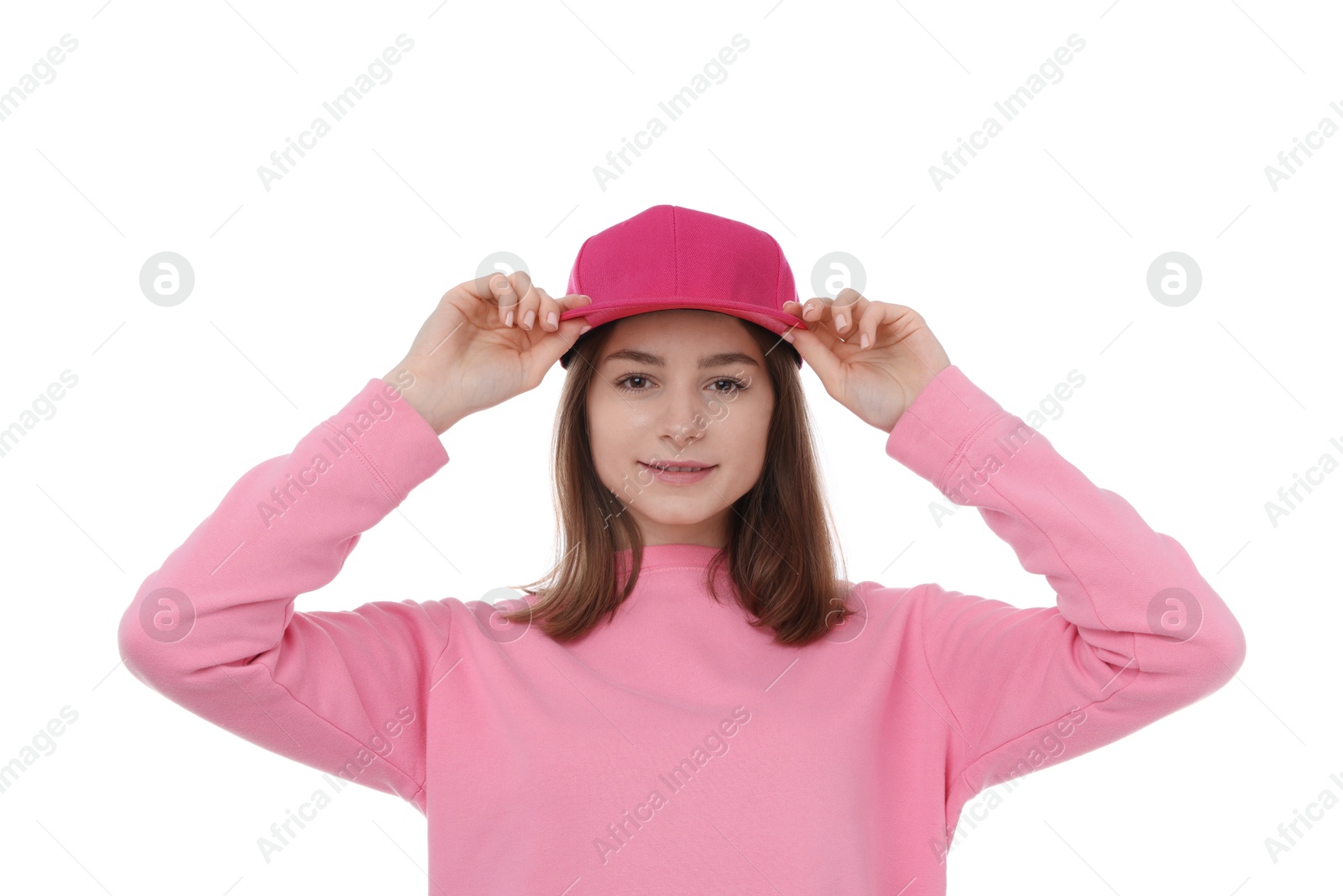 Photo of Young woman wearing stylish pink baseball hat on white background