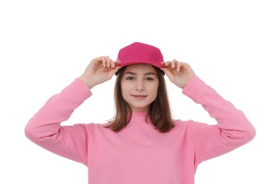Photo of Young woman wearing stylish pink baseball hat on white background