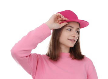 Photo of Young woman wearing stylish pink baseball hat on white background