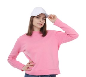 Photo of Young woman wearing stylish baseball hat on white background