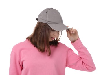 Photo of Young woman wearing stylish grey baseball hat on white background