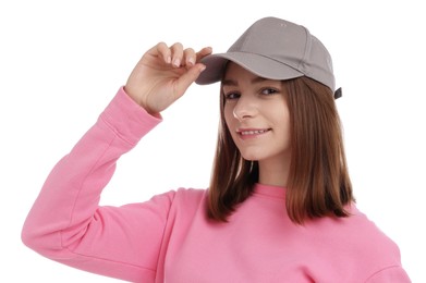 Photo of Young woman wearing stylish grey baseball hat on white background