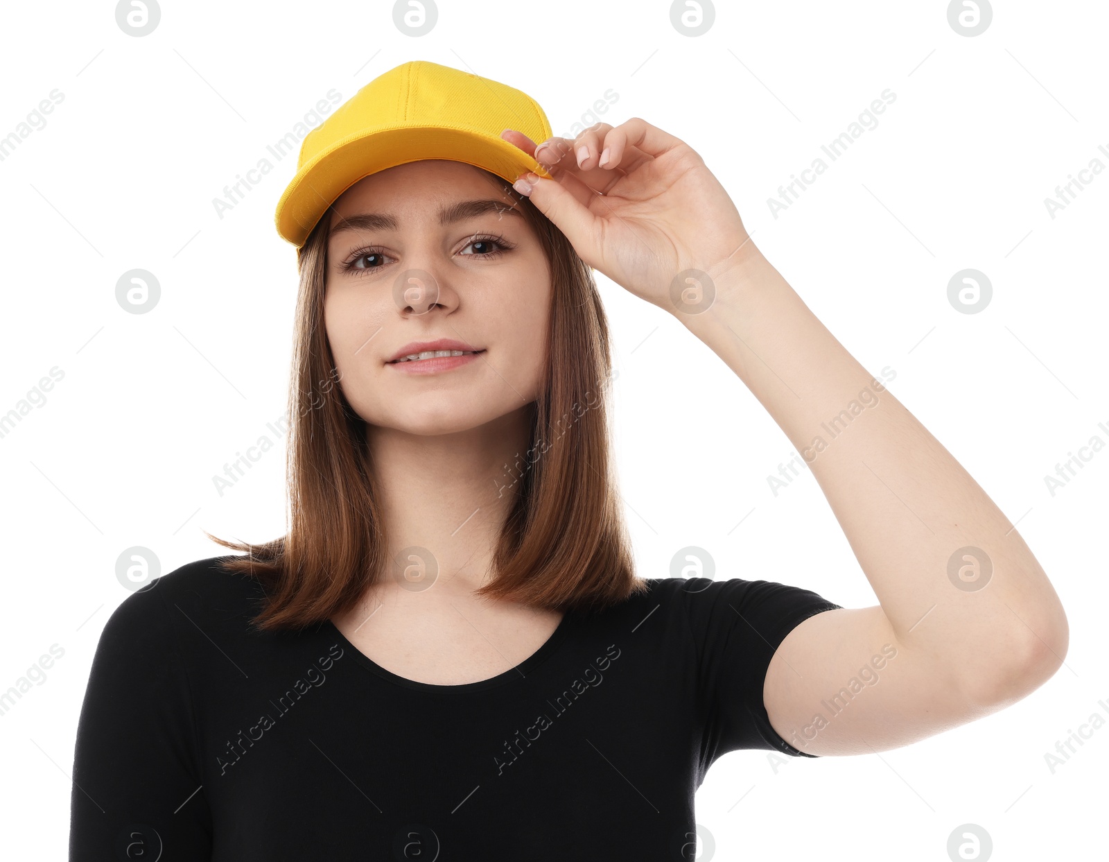 Photo of Young woman wearing stylish yellow baseball hat on white background