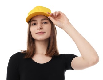 Photo of Young woman wearing stylish yellow baseball hat on white background