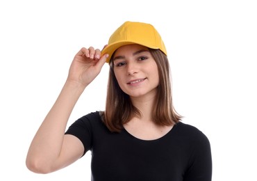 Photo of Young woman wearing stylish yellow baseball hat on white background