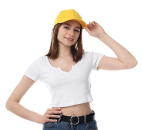 Photo of Young woman wearing stylish yellow baseball hat on white background