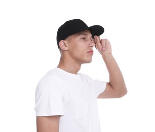Photo of Young man wearing stylish black baseball hat on white background