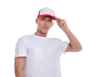 Photo of Young man wearing stylish baseball hat on white background