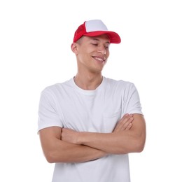 Photo of Young man wearing stylish baseball hat on white background