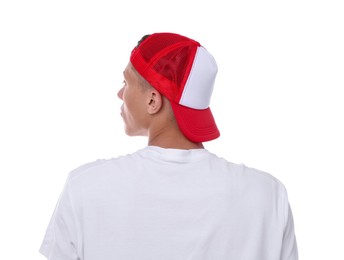 Photo of Young man wearing stylish baseball hat on white background, back view