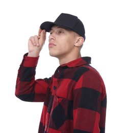 Photo of Young man wearing stylish black baseball hat on white background