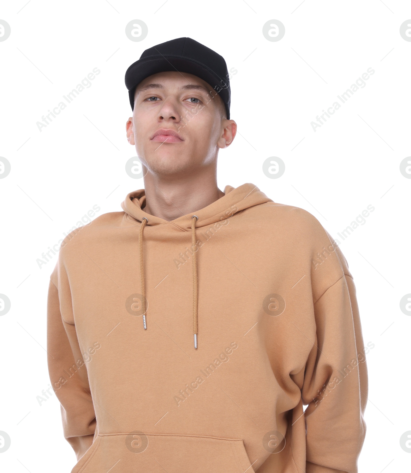 Young man wearing stylish black baseball hat on white background Photo of Young man wearing stylish black baseball hat on white background