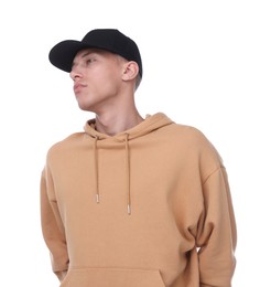 Photo of Young man wearing stylish black baseball hat on white background