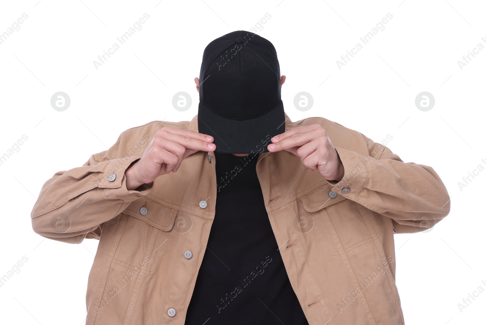 Young man wearing stylish black baseball hat on white background Photo of Young man wearing stylish black baseball hat on white background