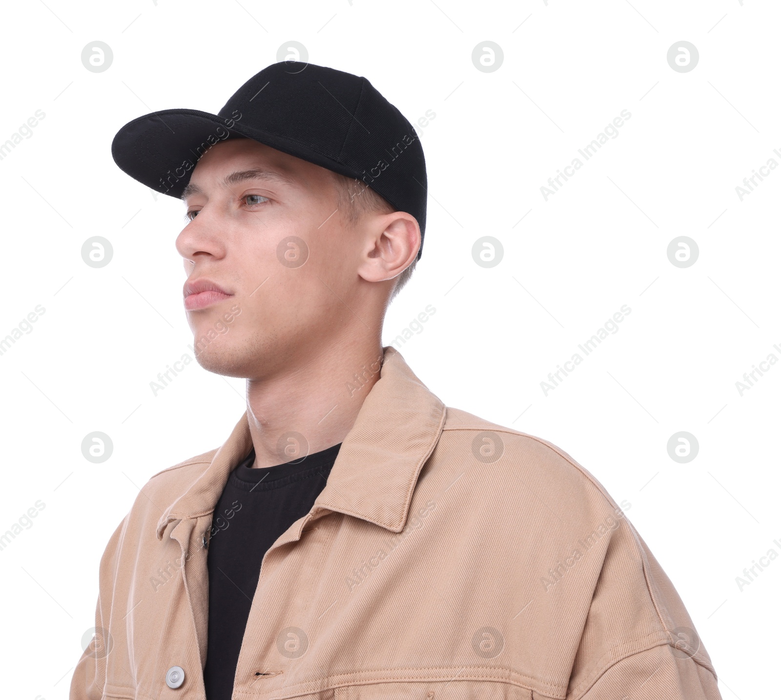 Young man wearing stylish black baseball hat on white background Photo of Young man wearing stylish black baseball hat on white background