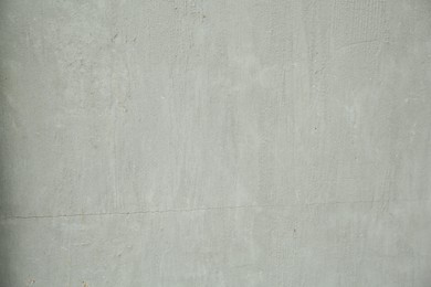 Photo of Grey cement textured surface as background, closeup
