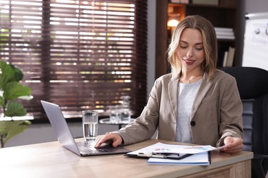 Photo of Marketing. Woman working at desk in office