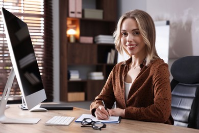 Photo of Marketing. Woman working at desk in office