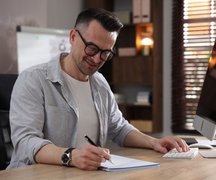 Photo of Marketing. Man working at desk in office