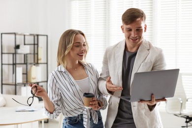 Photo of Marketing. Two colleagues working together in office