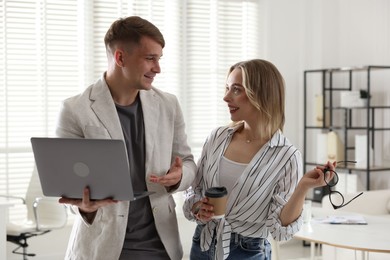 Photo of Marketing. Two colleagues working together in office