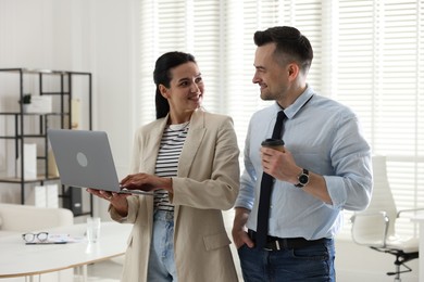 Photo of Marketing. Two colleagues working together in office