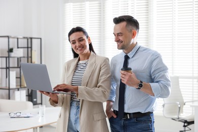 Photo of Marketing. Two colleagues working together in office