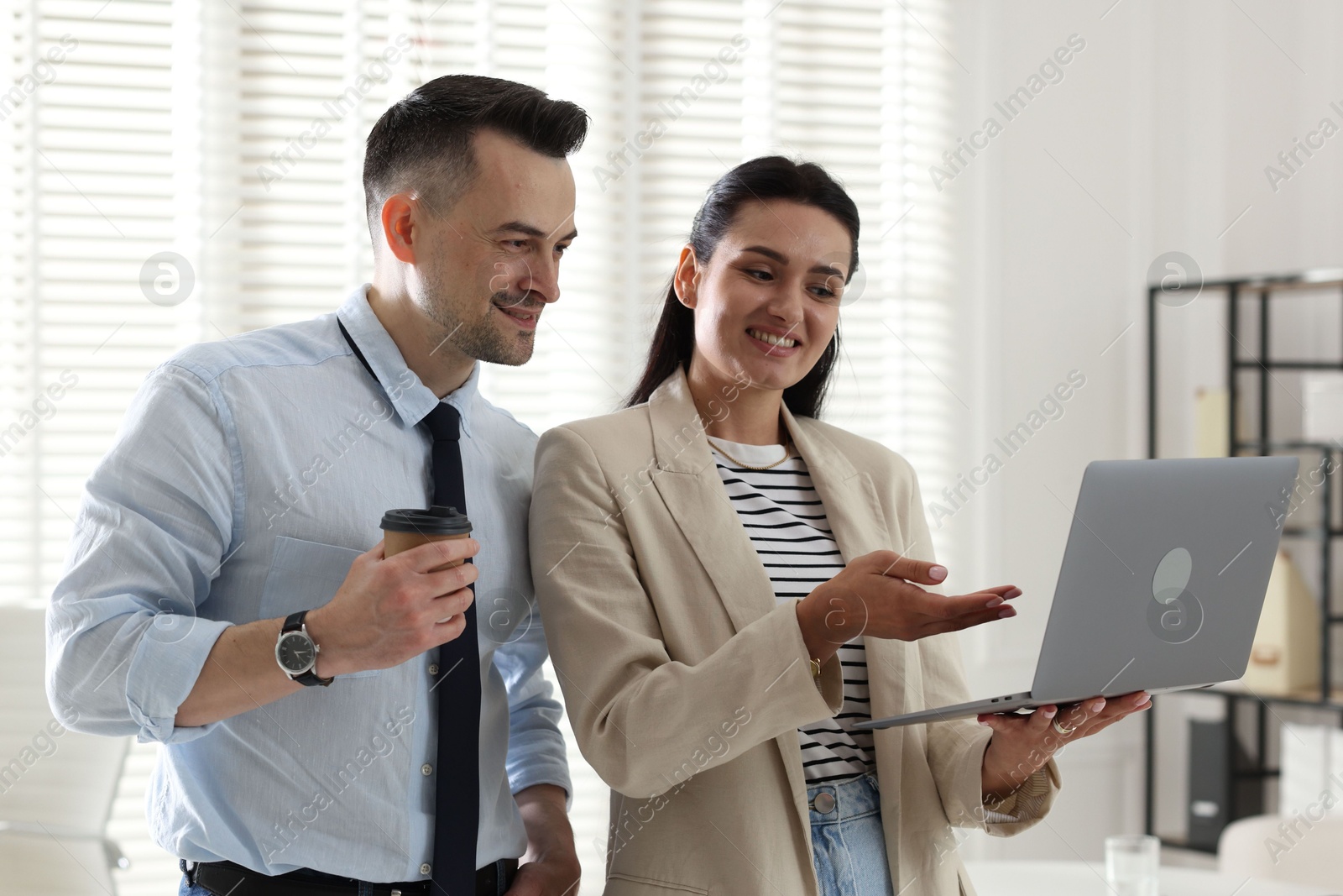 Marketing. Two colleagues working together in office Photo of Marketing. Two colleagues working together in office