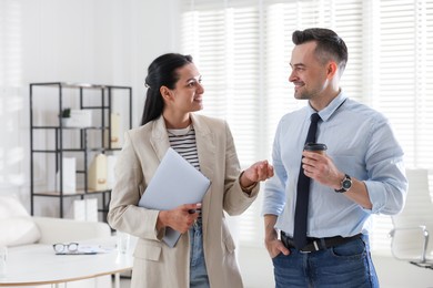 Photo of Marketing. Two colleagues working together in office