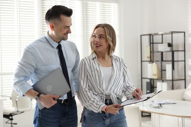 Photo of Marketing. Two colleagues working together in office