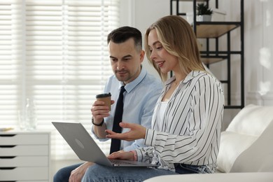 Photo of Marketing. Two colleagues working together in office