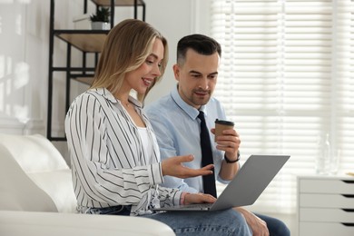 Photo of Marketing. Two colleagues working together in office