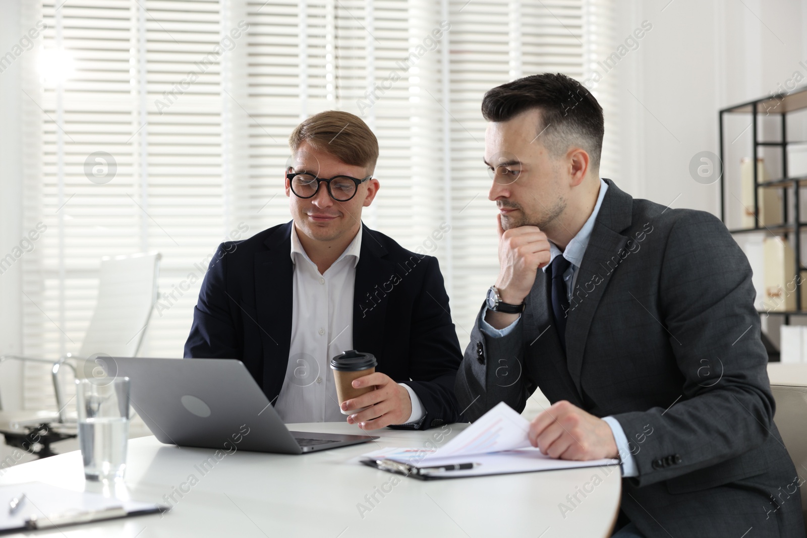 Marketing. Two colleagues working together in office Photo of Marketing. Two colleagues working together in office