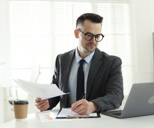 Photo of Marketing. Man working at desk in office
