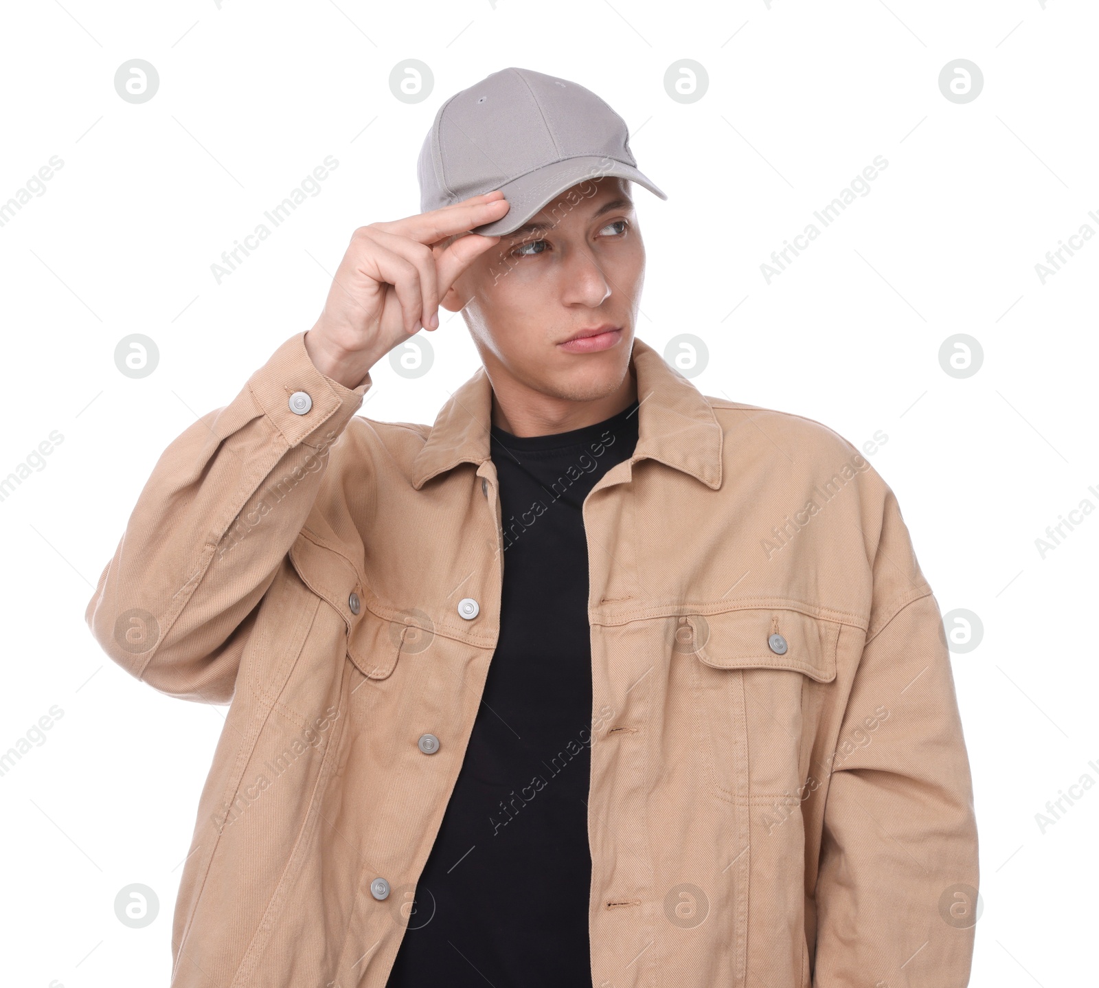 Young man wearing stylish grey baseball hat on white background Photo of Young man wearing stylish grey baseball hat on white background