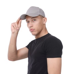 Photo of Young man wearing stylish grey baseball hat on white background