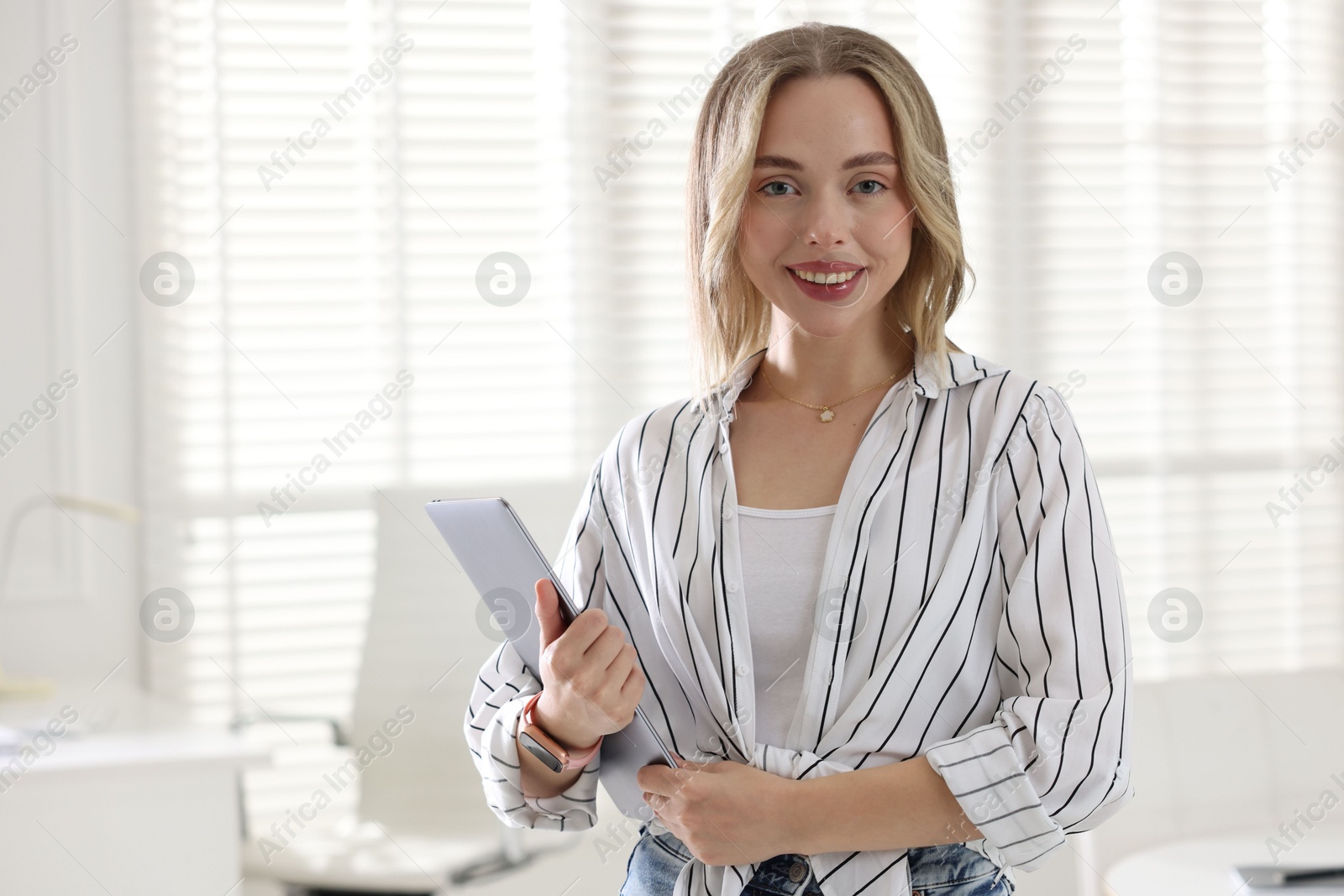 Marketing. Happy woman with laptop in office, space for text Photo of Marketing. Happy woman with laptop in office, space for text