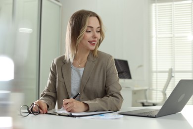 Photo of Marketing. Woman working at desk in office