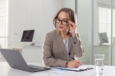 Photo of Marketing. Woman working at desk in office