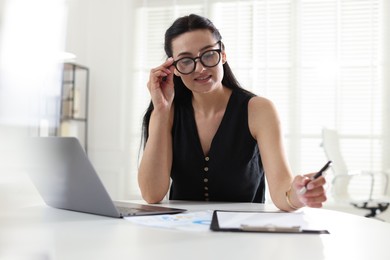 Photo of Marketing. Woman working at desk in office