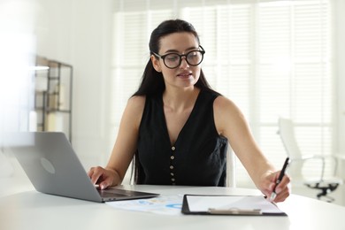 Photo of Marketing. Woman working at desk in office
