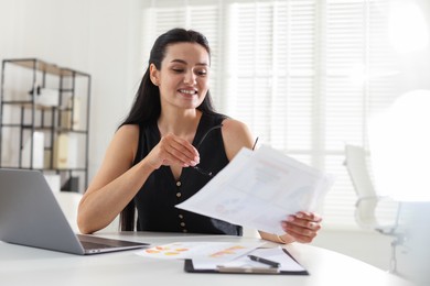 Photo of Marketing. Woman working at desk in office