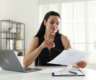 Photo of Marketing. Woman working at desk in office