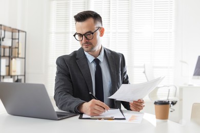 Photo of Marketing. Man working at desk in office